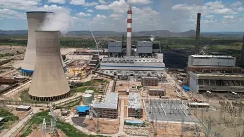 Cooling towers and generating units at the Hwange power station expansion.